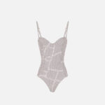 Swimsuit with polka dot print and ribbons