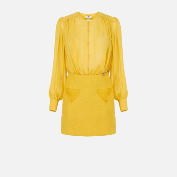 Dress in georgette and bouclé tweed fabrics