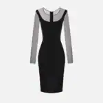 Dress in lightweight crêpe and tulle fabrics with cut-outs